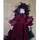 Poupée porcelaine 1900 bordeaux et dentelle noire