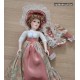 poupee porcelaine rose saumon et sa dentelle