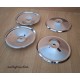 Un lot de 4 enjoliveurs de roue en inox 2CV/Dyane/Acadiane/Méhari